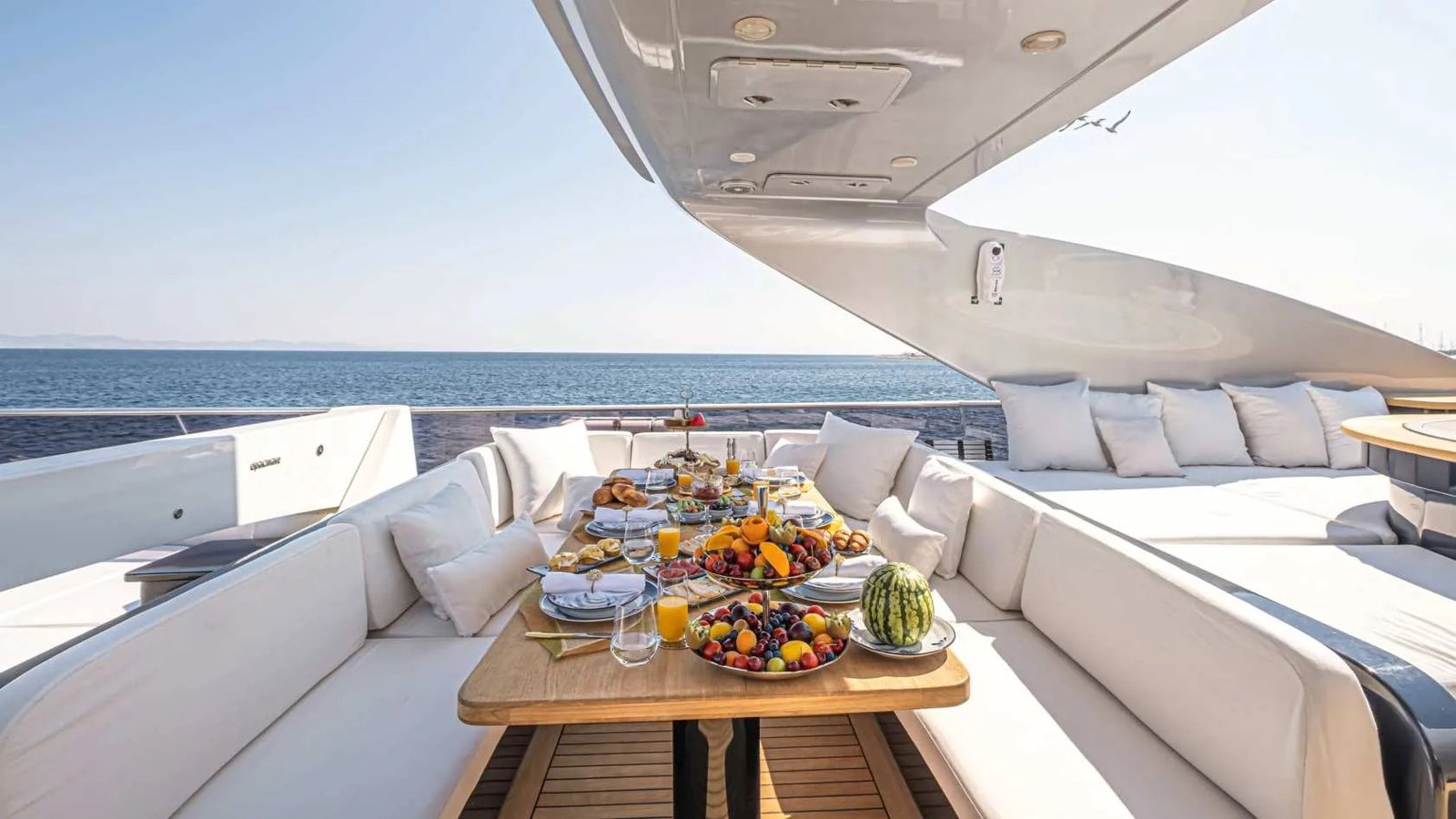 Breakfast setup on the aft deck of LUX40M
